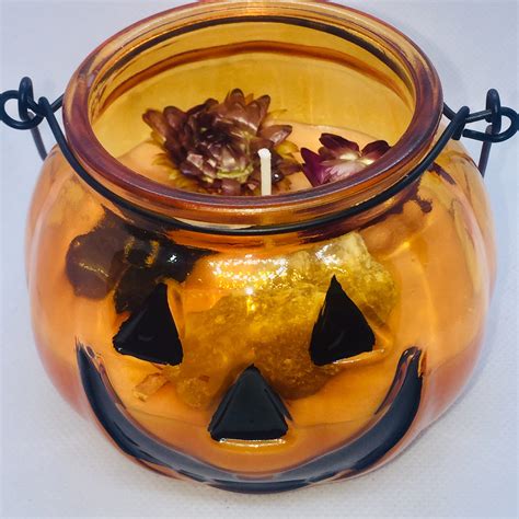 empty pumpkin candle jars|More.